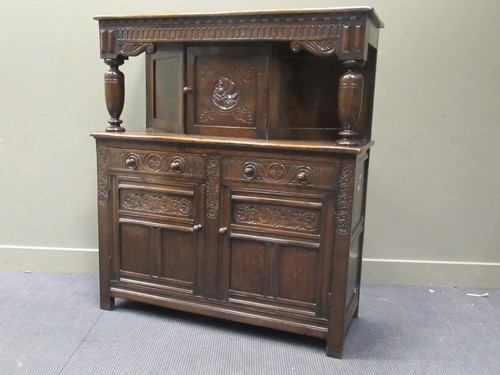 Lot 394 - A 17th century style reproduction oak court...