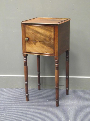 Lot 365 - A 19th century mahogany bedside cabinet on...