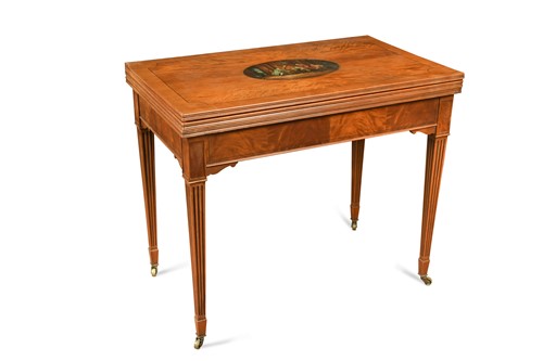 Lot 298 - A Victorian satinwood combination games table