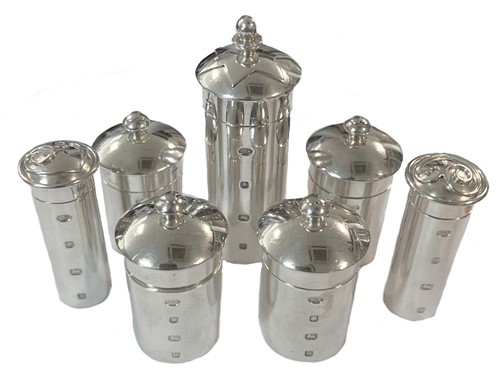 Lot 382 - A collection of seven 20th century silver pill bottles, all with mark of Mappin & Webb