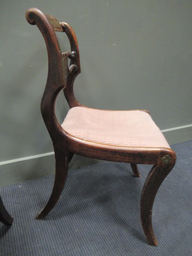 Lot 414 - A pair of Regency rosewood bar back chairs...