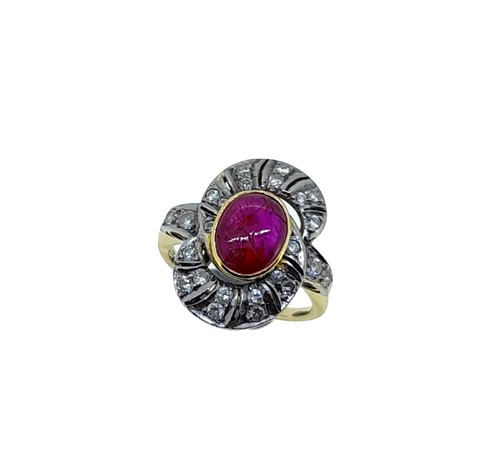 Lot 35 - A ruby and diamond dress ring