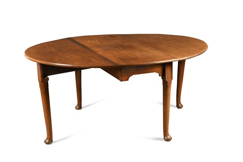 Lot 197 - A George II mahogany drop leaf table with pad feet
