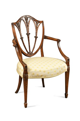Lot 363 - A George III mahogany Hepplewhite style elbow chair