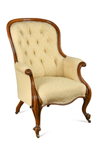 Lot 319 - A Victorian walnut button back armchair