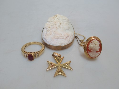 Lot 165 - A hallmarked 18ct gold ruby ring, a cameo ring...
