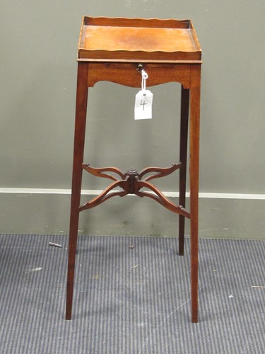 Lot 352 - A mahogany urn stand, early 19th century, the...