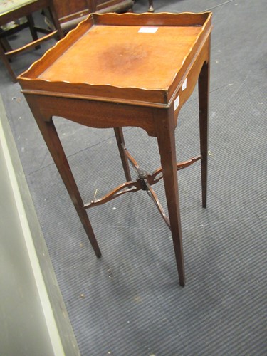 Lot 352 - A mahogany urn stand, early 19th century, the...
