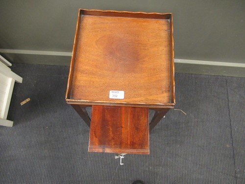 Lot 352 - A mahogany urn stand, early 19th century, the...