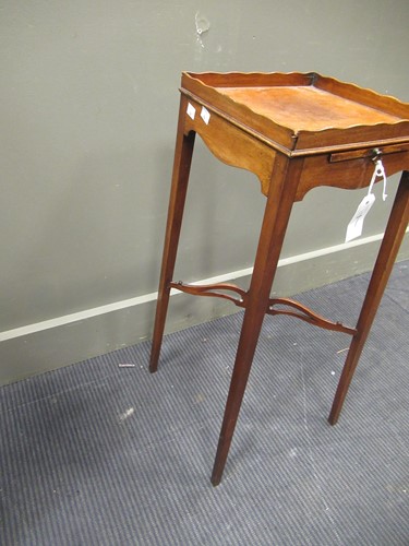 Lot 352 - A mahogany urn stand, early 19th century, the...