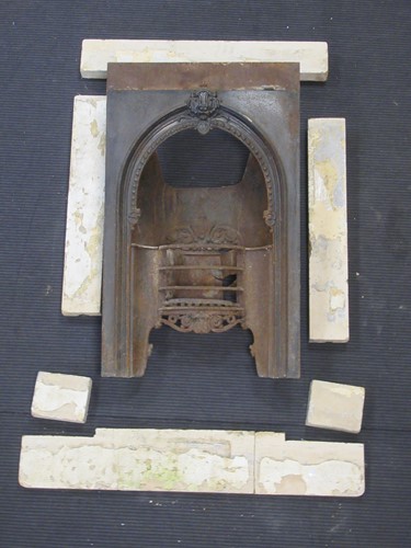 Lot 392 - A George III stone fireplace surround, the...