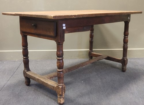 Lot 399 - An 18th century fruitwood? kitchen table, a...