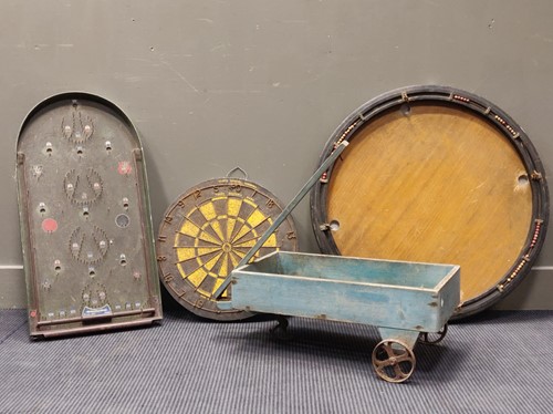 Lot 467 - A bagatelle board together with a cork darts...