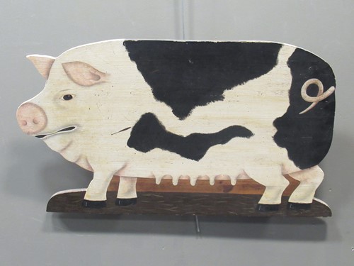 Lot 111 - A painted wood sow fret cut wall hanging board