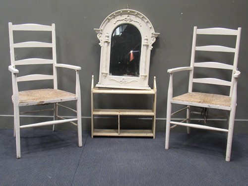 Lot 420 - A pair of white painted ladder back chairs...