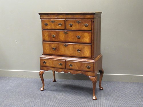 Lot 339 - A George II style figured walnut chest on...