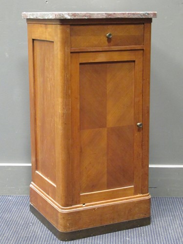 Lot 349 - A 20th century marble topped pedestal cupboard,...
