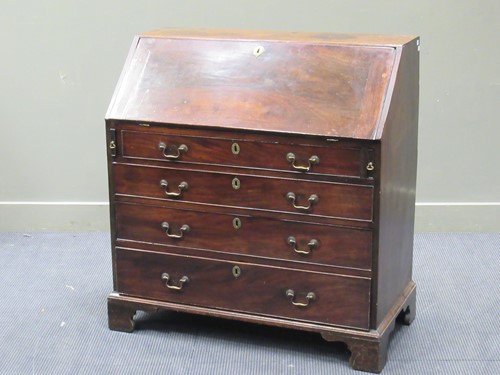 Lot 326 - A George III mahogany bureau, with fall front...