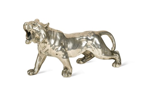 Lot 276 - A Japanese white metal model of a roaring tiger, early 20th century
