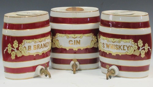 Lot 12 - A set of three Victorian spirit barrels, 'Gin',...