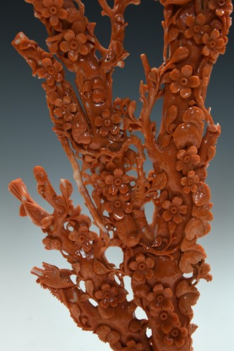 Lot 94 - A Chinese coral branch carving, late Qing Dynasty, 19th/20th century