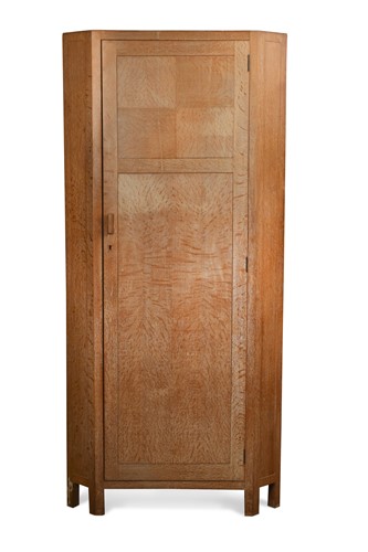 Lot 223 - A Heal's limed oak corner cupboard, circa 1930