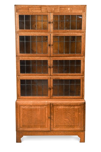Lot 230 - An Art Deco sectional oak bookcase by Minty of Oxford