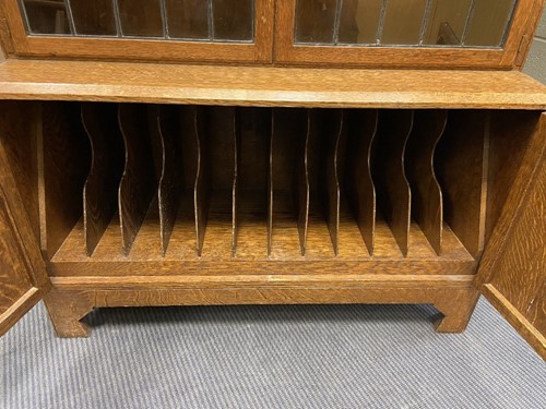 Lot 230 - An Art Deco sectional oak bookcase by Minty of Oxford