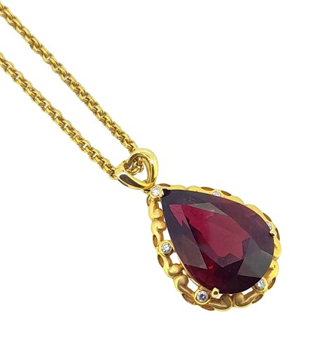 Lot 168 - A rubellite and diamond pendant and chain