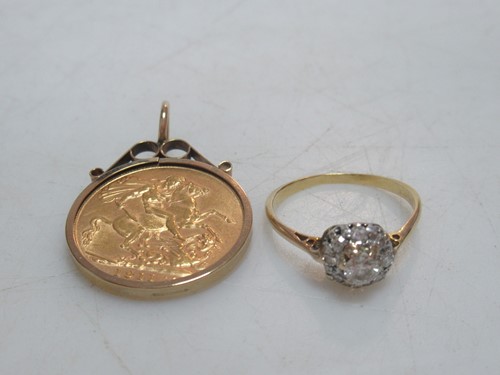 Lot 157 - A full sovereign dated 1911 in a hallmarked...