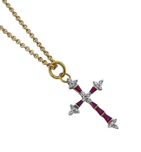 Lot 155 - A ruby and diamond cross pendant and chain