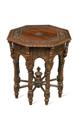 Lot 261 - An intricately-carved hardwood occasional table, probably Indian, 19th century