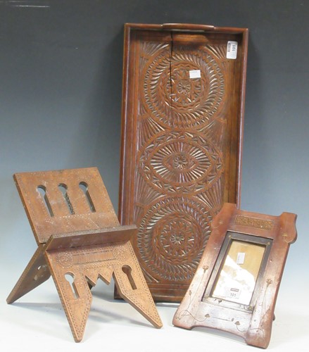 Lot 101 - A chip carved tray (cracked), a small carved...