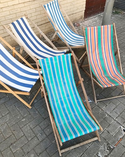 Lot 459 - Five vintage folding deck-chairs with original...
