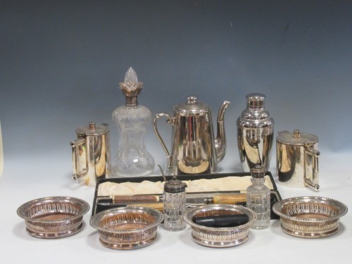 Lot 200A - A silver mounted glass 'glug glug' decanter...