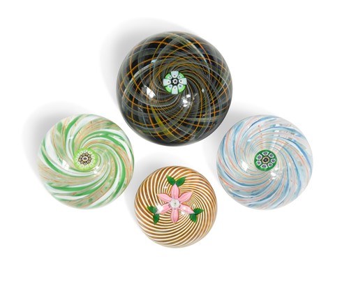 Lot 28 - A collection of four Perthshire glass swirl paperweights