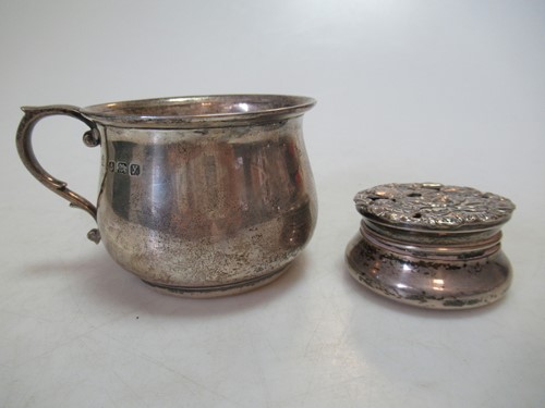 Lot 184 - A small silver cup together with a silver pot...