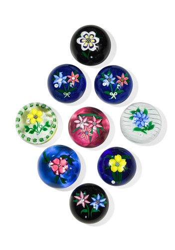 Lot 31 - A group of nine John Deacons glass paperweights