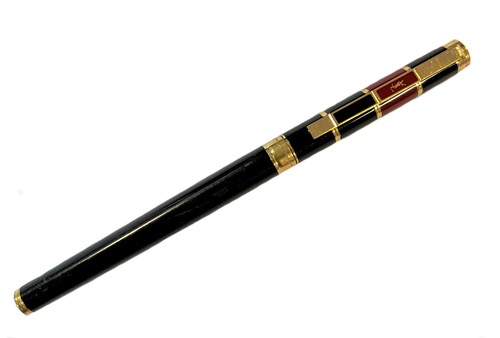 Lot 443 - Cartier/Yves St. Laurent - A two-colour lacquered rollerball pen