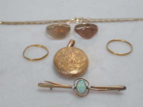 Lot 169 - A memorial locket tested as 9ct gold, a...