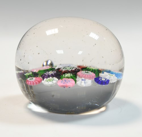 Lot 24 - A Clichy spaced millefiori glass paperweight
