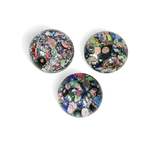 Lot 20 - A group of three scrambled millefiori glass paperweights