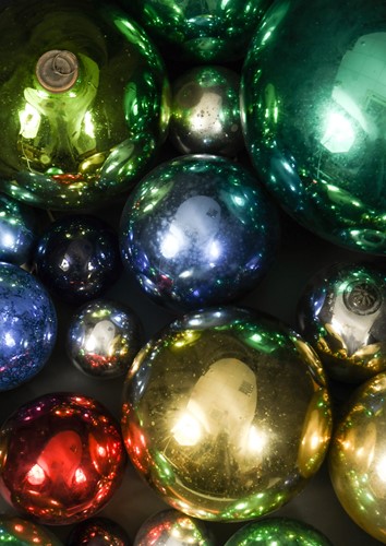 Lot 146 - A collection of twenty glass witches' balls, late 19th and early 20th century
