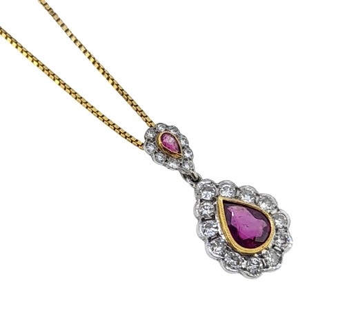 Lot 156 - A ruby and diamond cluster pendant and chain