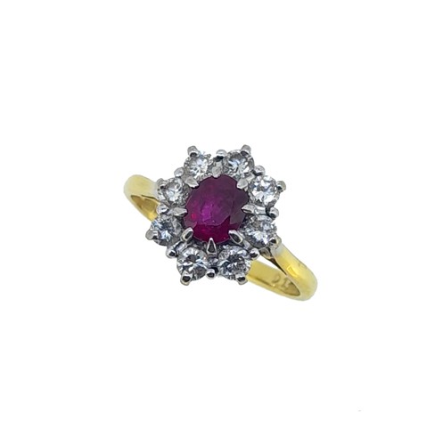 Lot 162 - A late 20th century ruby and diamond cluster ring