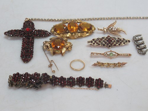 Lot 175 - A yellow metal cross pendant attached to a...