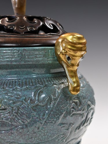 Lot 14 - A Chinese robin's egg glazed tripod censer, 18th/19th century