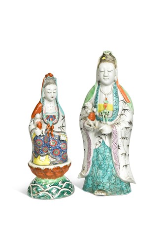 Lot 35 - A Chinese porcelain standing Guanyin with child, Qing Dynasty, 19th century