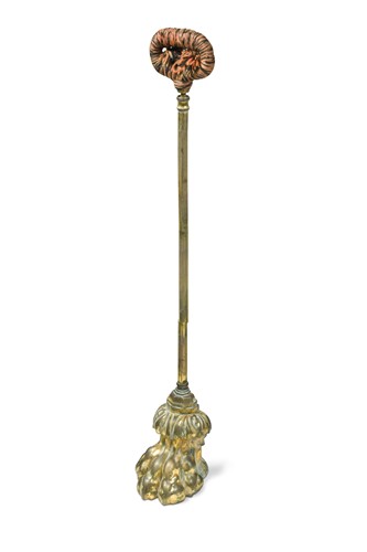 Lot 310 - An over-scale gilt brass lion paw door porter, 19th century