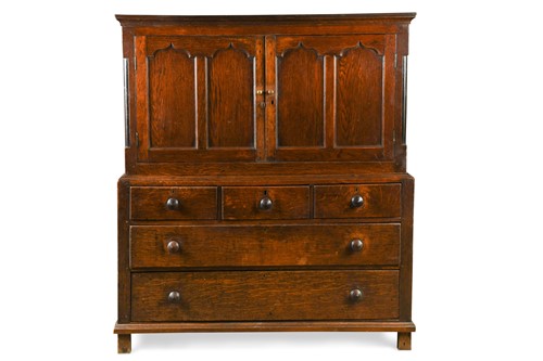 Lot 107 - A Georgian oak cupboard
